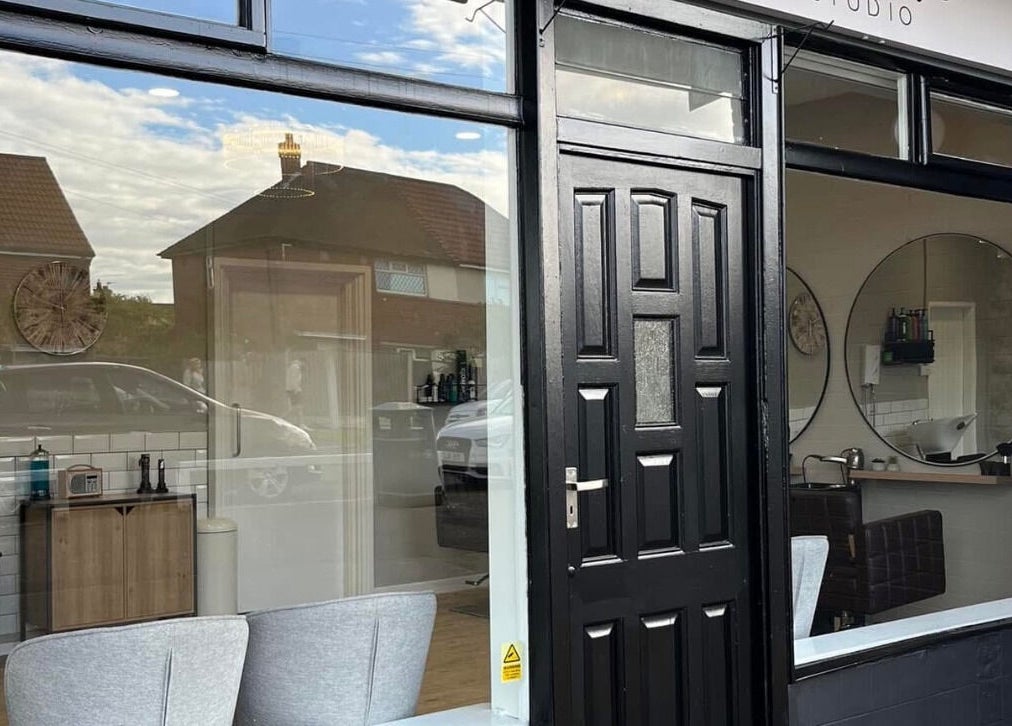 Front of Nails by Erika in Morley, England, GB showing modern salon interior.