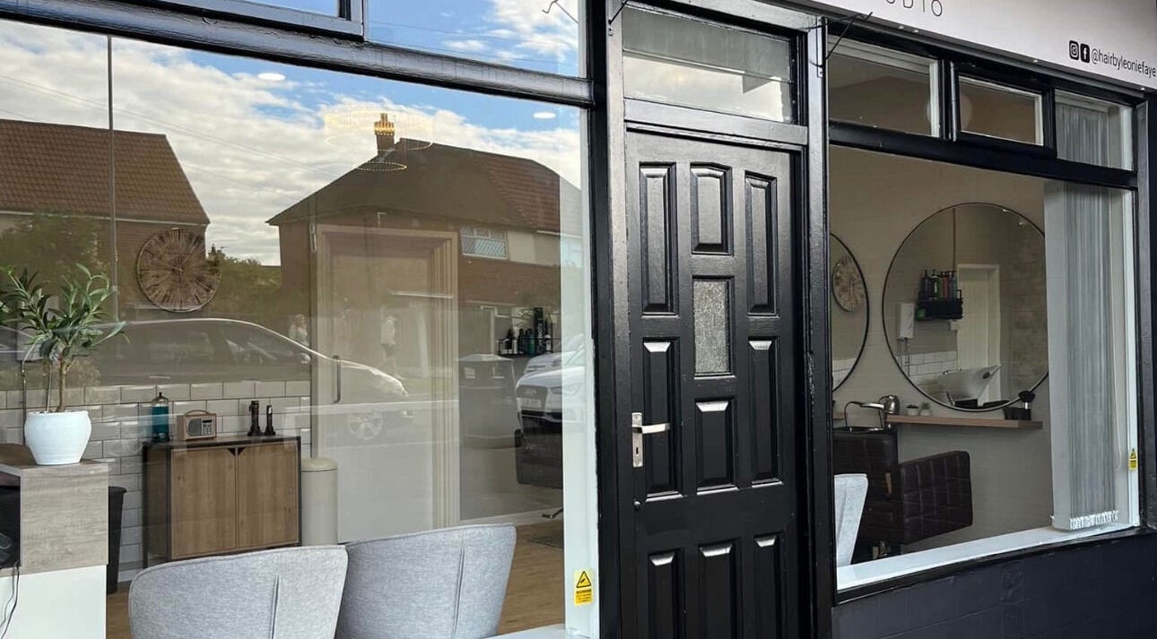 Front of Nails by Erika in Morley, England, GB showing modern salon interior.