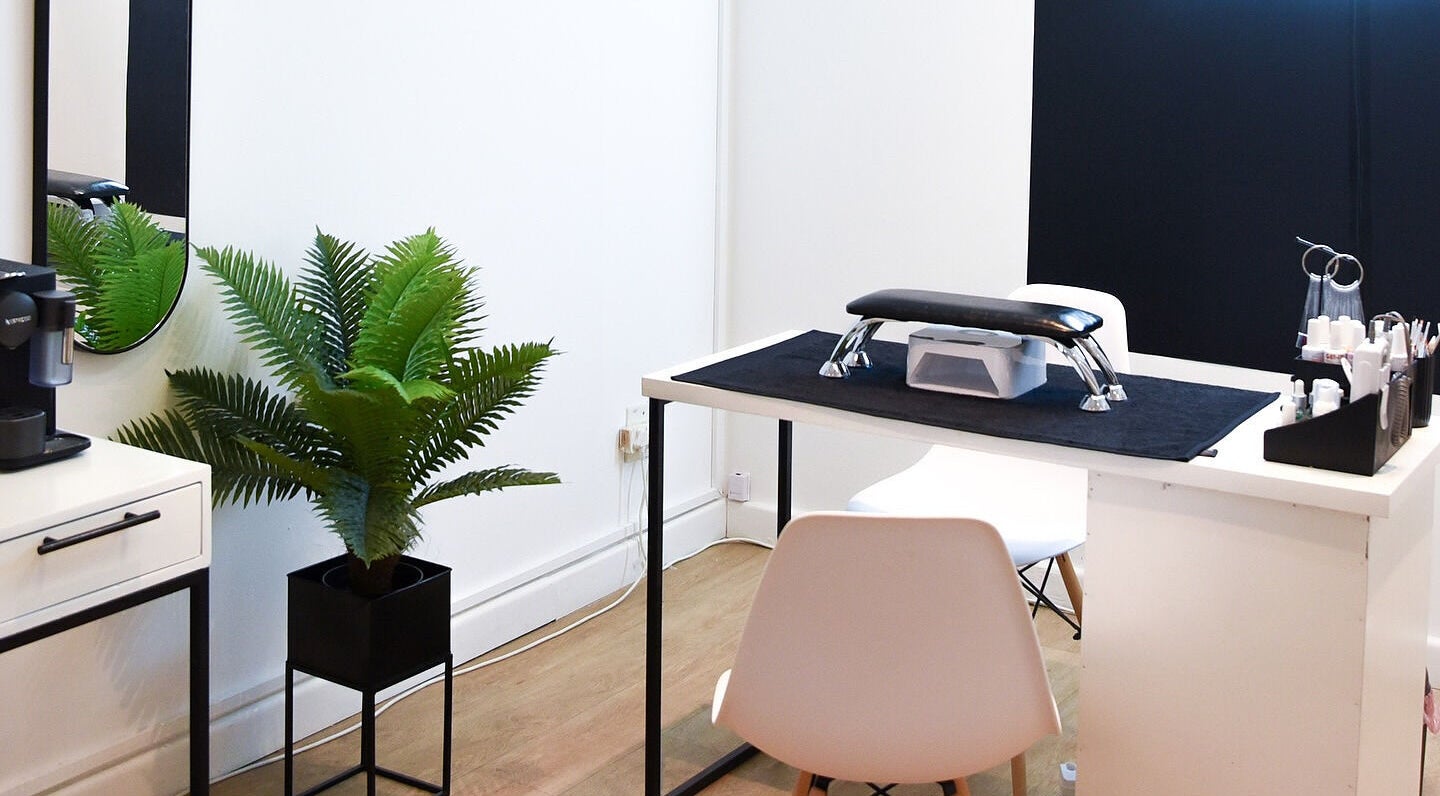 Stylish nail table setup at Nova Beauty Studio, Cape Town, Western Cape, ZA, featuring modern decor.