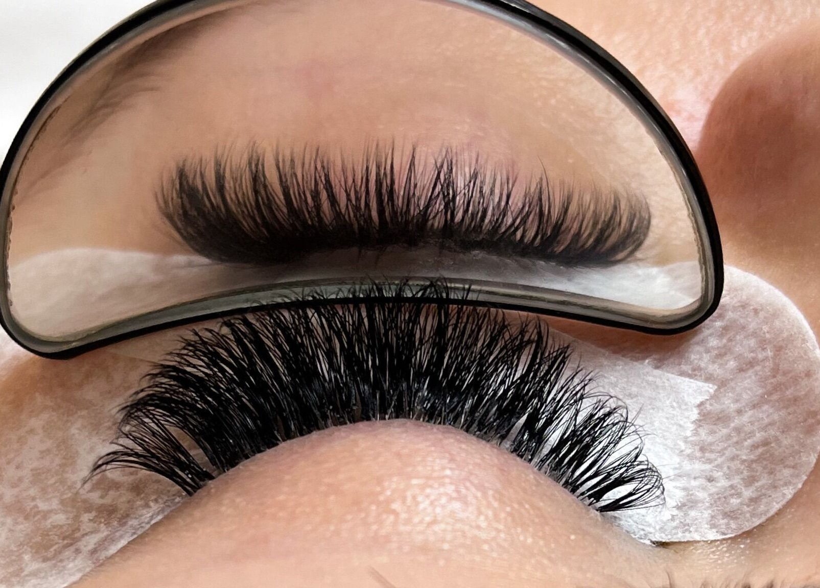 Close-up of expert eyelash extension at Nova Beauty Studio, Cape Town, Western Cape, ZA.