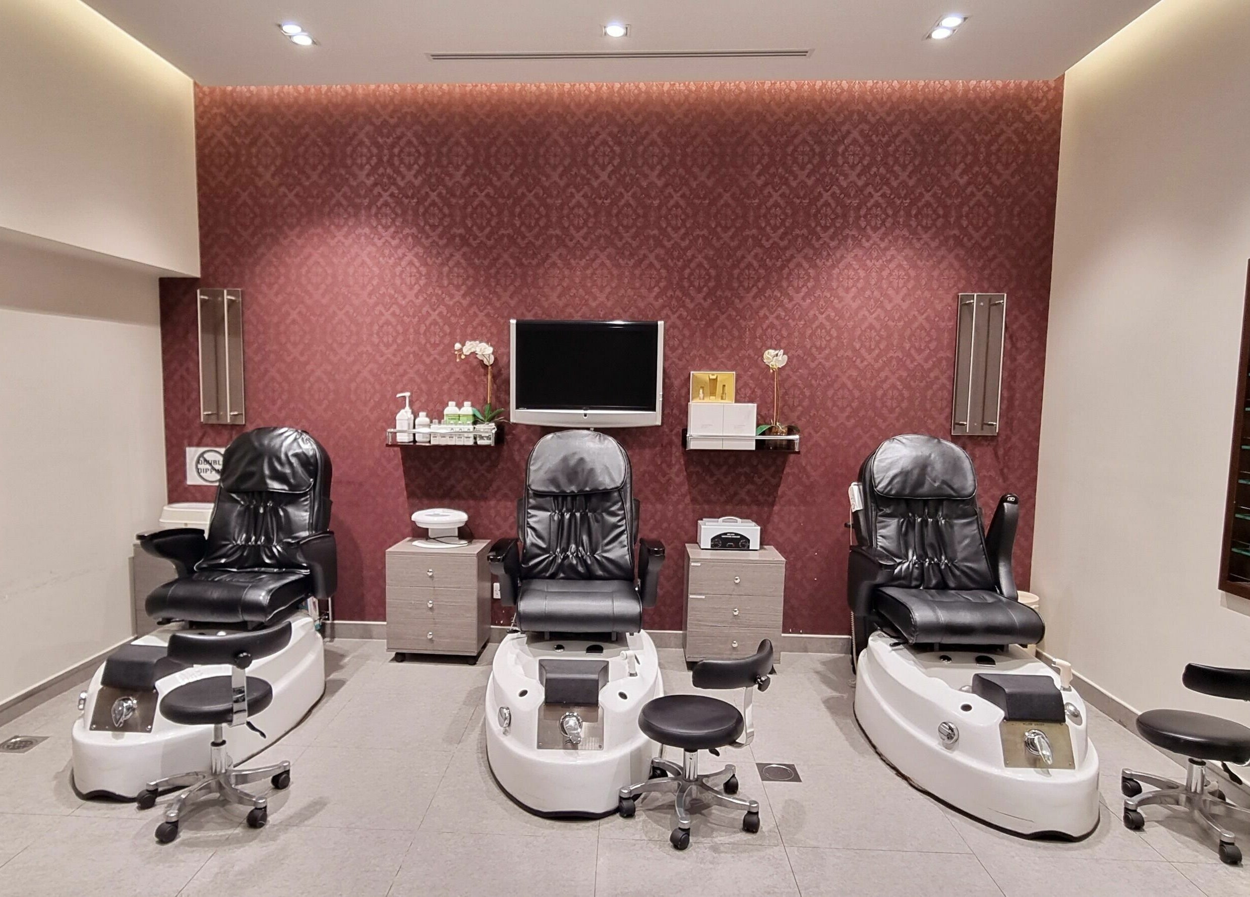 Luxurious pedicure chairs at Amaya Salon and Spa in Dubai, AE, create a serene retreat for relaxation.