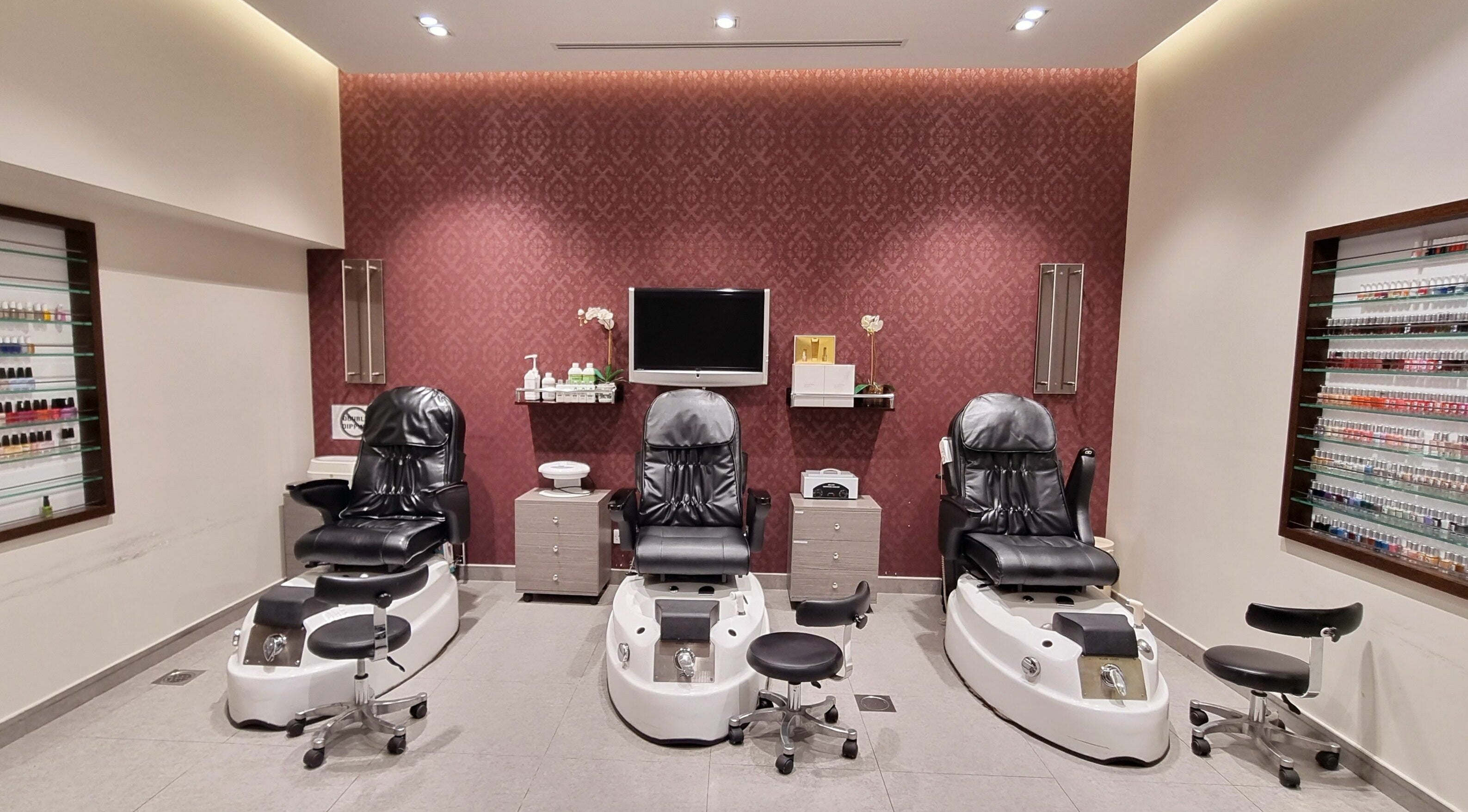 Luxurious pedicure chairs at Amaya Salon and Spa in Dubai, AE, create a serene retreat for relaxation.