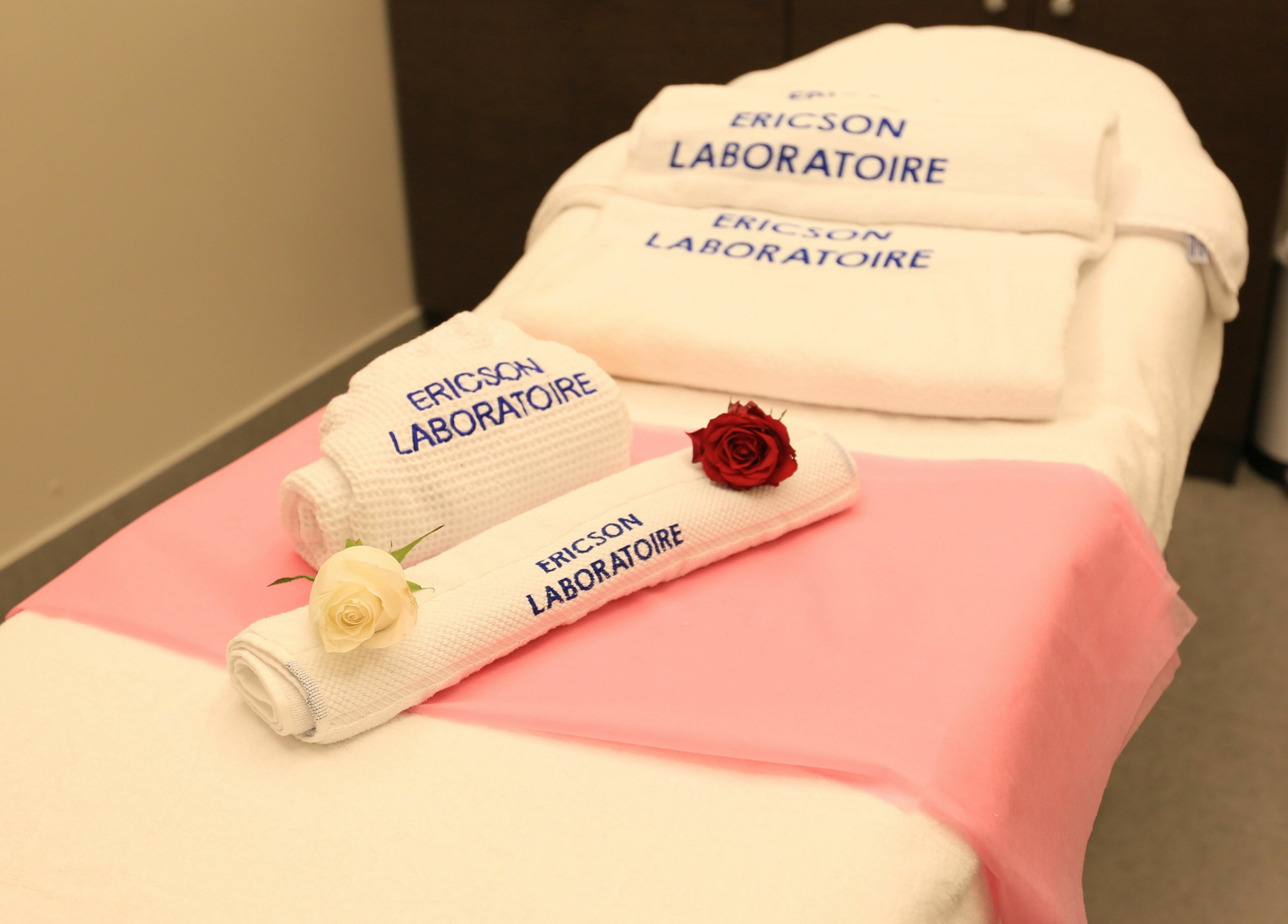 Spa treatment table with plush towels at Amaya Salon and Spa, Dubai, AE.