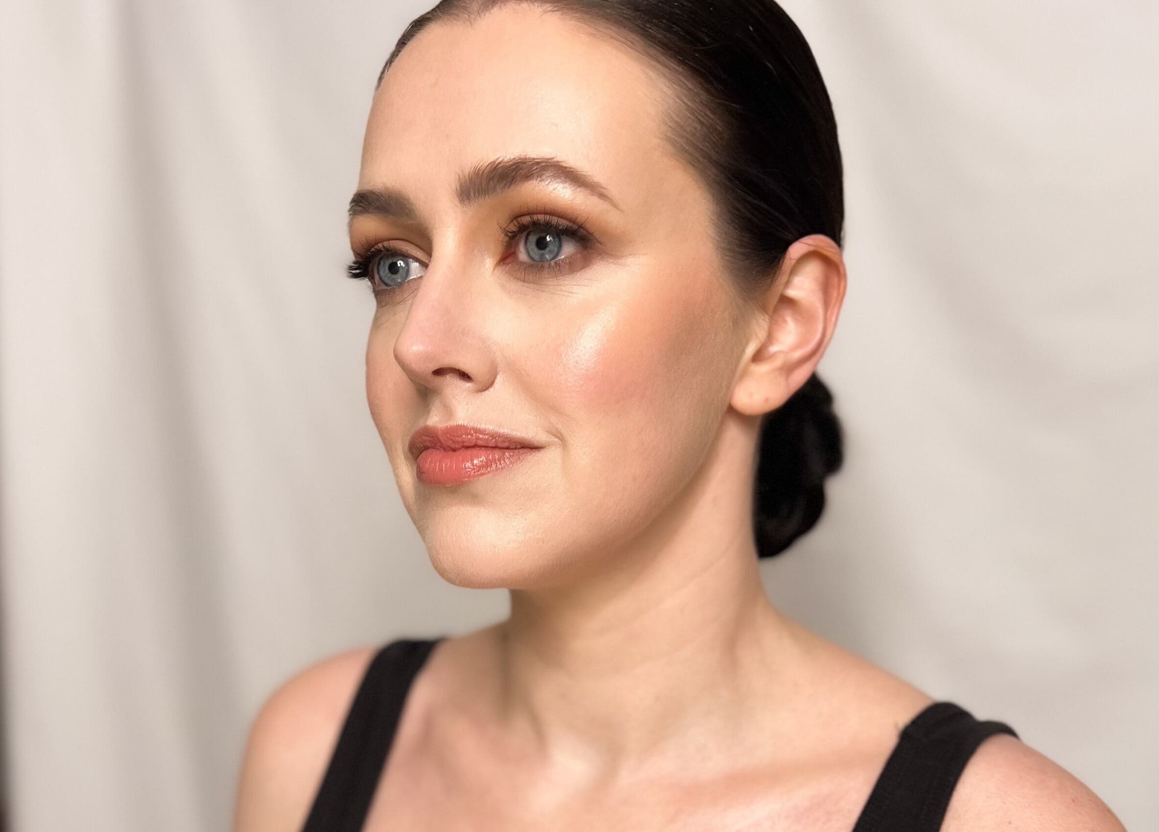 Sophisticated woman with elegant makeup at Andrea Maxwell Artemisia Hair & Beauty Studio in Cawdor, Scotland, GB.