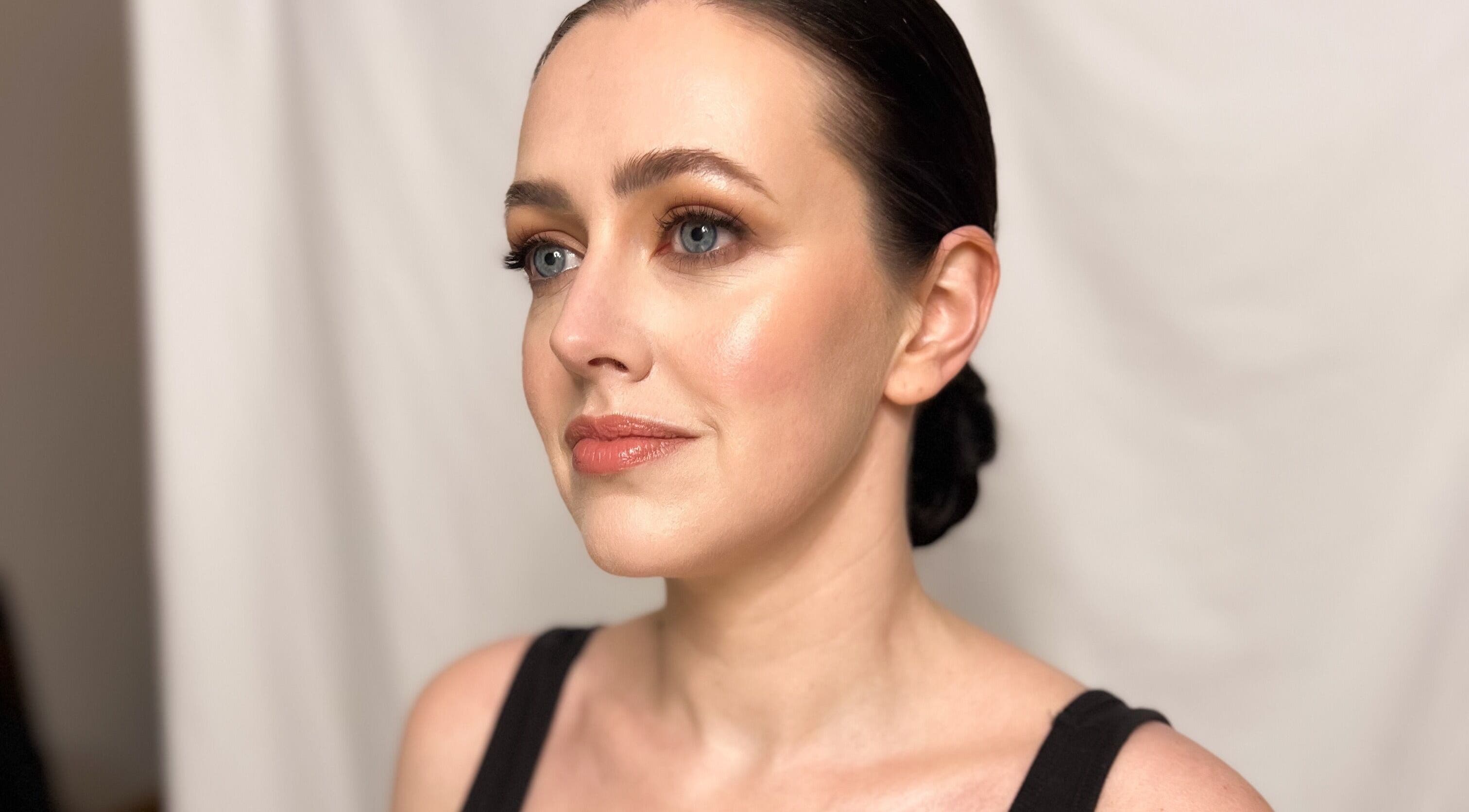 Sophisticated woman with elegant makeup at Andrea Maxwell Artemisia Hair & Beauty Studio in Cawdor, Scotland, GB.