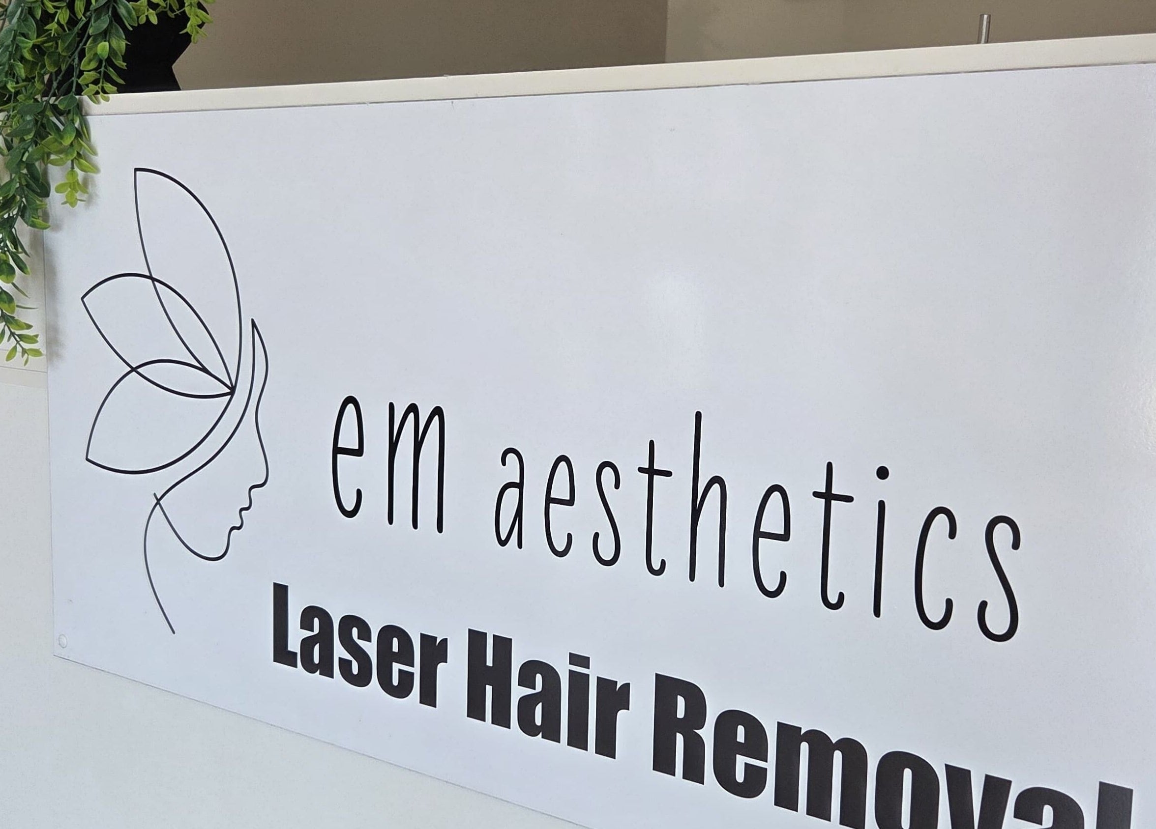 EM Aesthetics Potchefstroom sign in Potchefstroom, North West, ZA highlighting laser hair removal services.