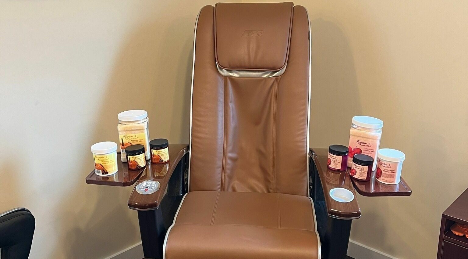 Relaxing spa chair at Laporte’s Hidden Gem Day Spa in Laporte, Pennsylvania, US, surrounded by wellness products.