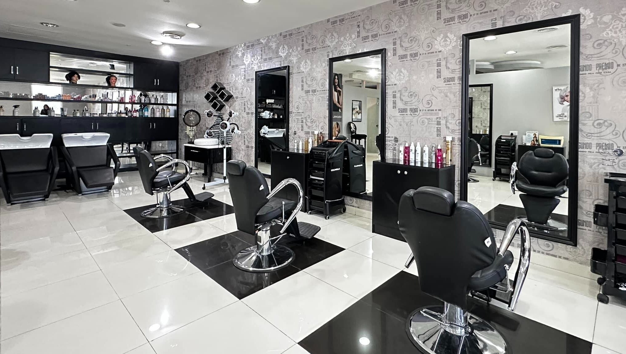 Interior of Crystal Beauty Lounge in Dubai, AE showing modern salon chairs and stylish decor.