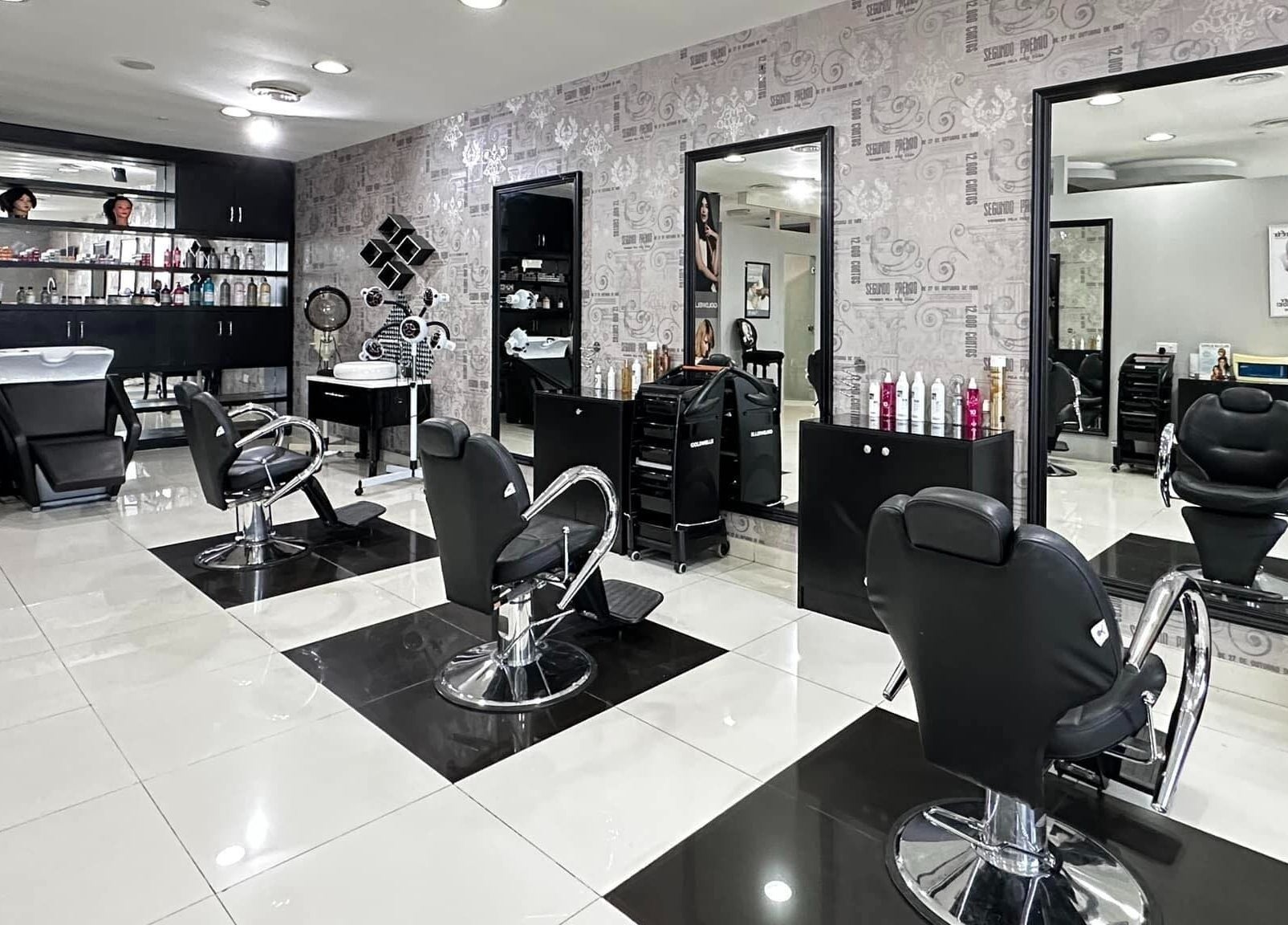 Interior of Crystal Beauty Lounge in Dubai, AE showing modern salon chairs and stylish decor.