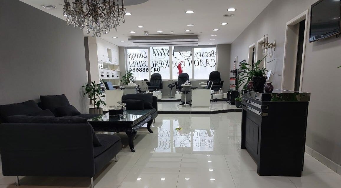Sleek interior of Crystal Beauty Lounge in Dubai, AE, showcasing elegant seating and modern decor.
