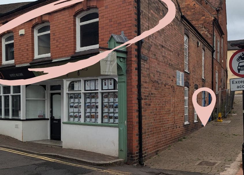 Front view of Skinfit Studio at Shifnal, England, GB, showcasing elegant brick exterior and signage.