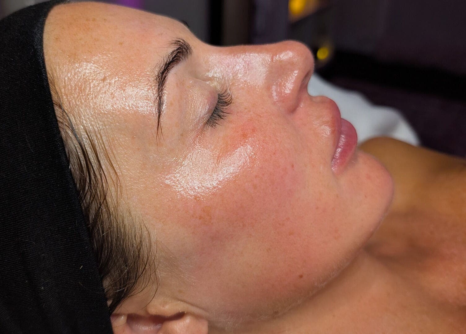 Close-up of a glowing facial at Skinfit Studio, Shifnal, England, GB, showcasing smooth skin.