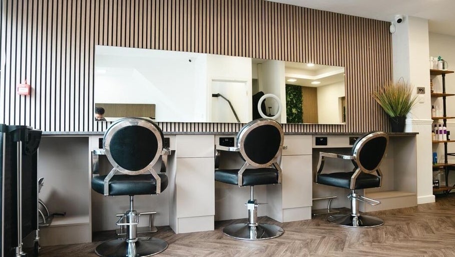 Modern salon styling chairs at VP Hair Art Co Sutton, Birmingham, England, GB with sleek, minimalist design.