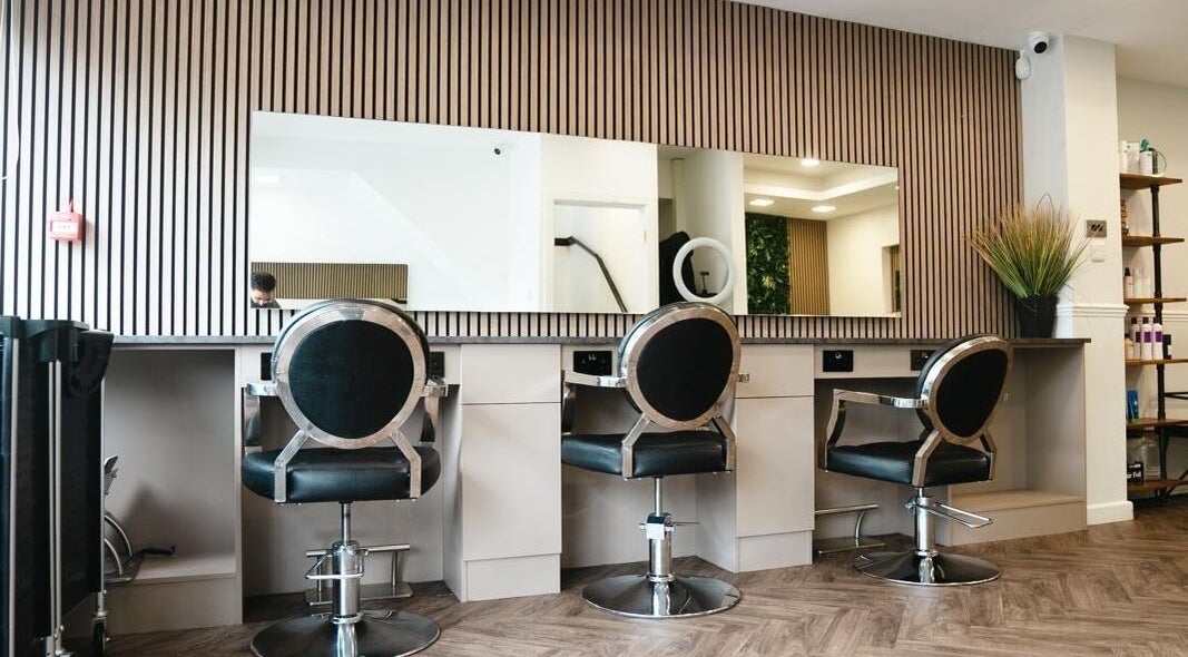 Modern salon styling chairs at VP Hair Art Co Sutton, Birmingham, England, GB with sleek, minimalist design.