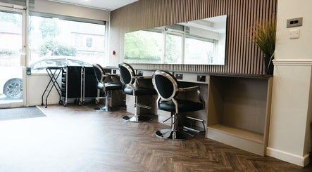 Modern salon interior with stylish chairs at VP Hair Art Co Sutton in Birmingham, England, GB.