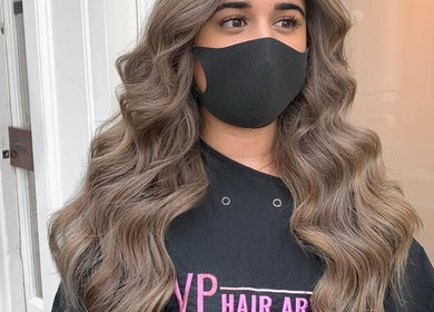 Styled hair with wavy finish at VP Hair Art Co Sutton, Birmingham, England, GB.