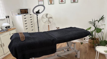 Treatment room at The Beauty Clinic in Stafford, England, GB showcasing a relaxing spa bed setup.