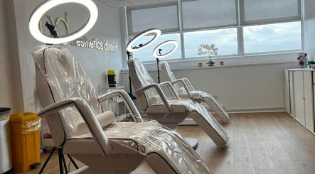 Modern treatment chairs at The Beauty Clinic, Stafford, England, GB with ambient lighting.
