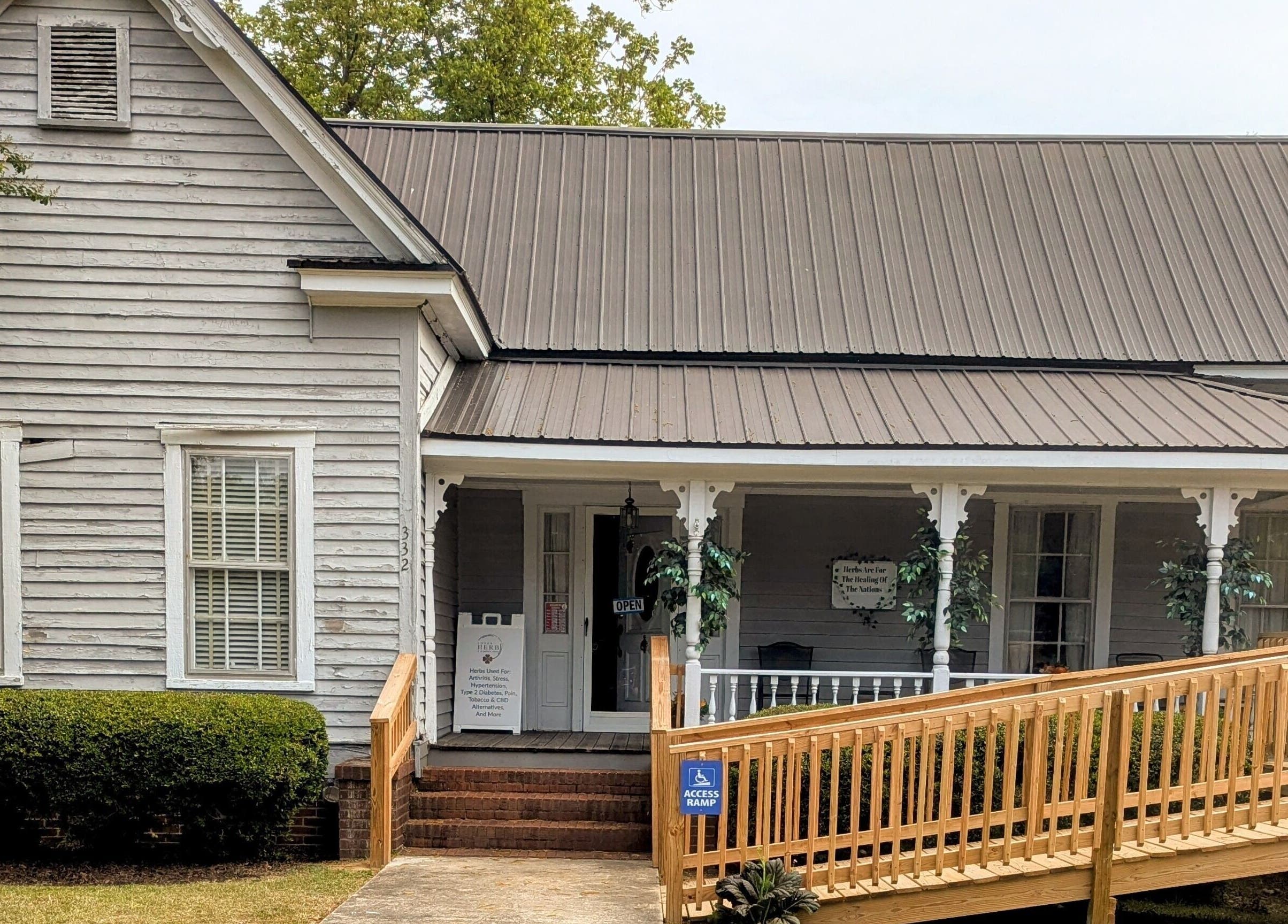 Front view of Arlana Styles Manextensions (ASME) in Latta, South Carolina, US, showcasing its welcoming entrance.