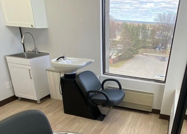 Modern shampoo station with a window view at Kurlessence, Ottawa, Ontario, CA.