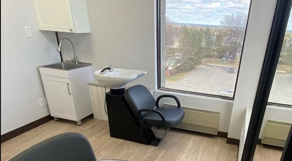 Modern shampoo station with a window view at Kurlessence, Ottawa, Ontario, CA.