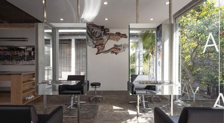 Modern interior of Hair Salon & Facial in Ubud — RASA GAYA, Bali, Bali, ID with sleek workstations and greenery.