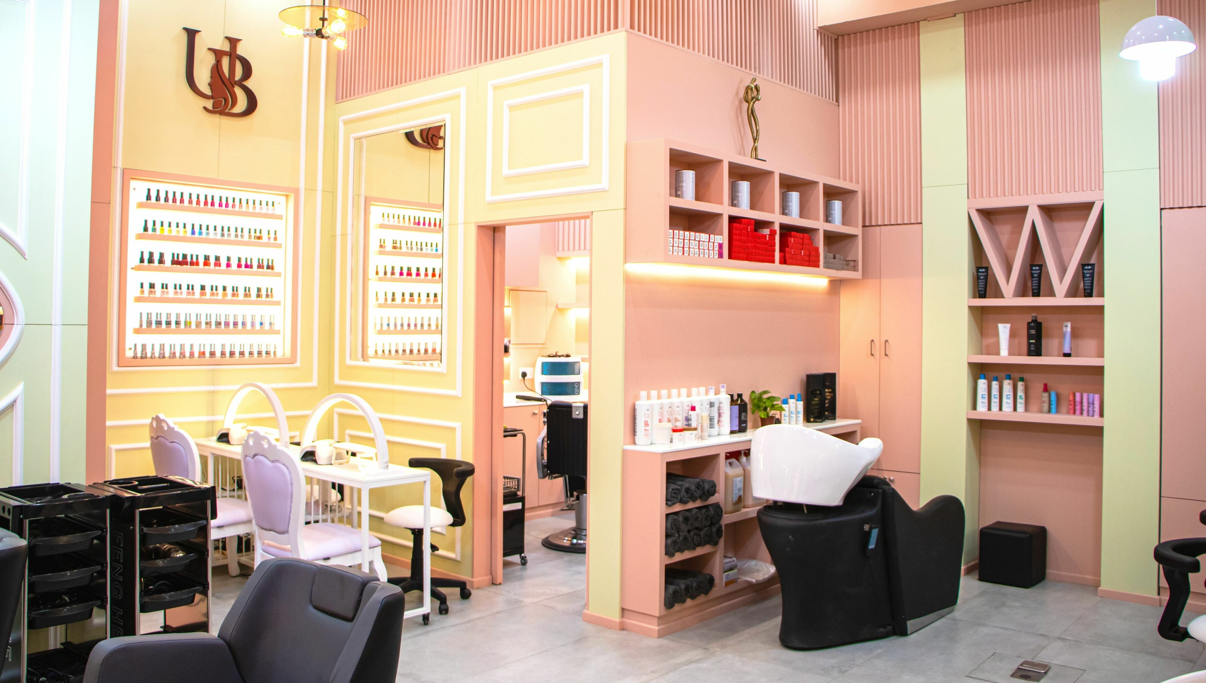 Beautiful interior of UB Beauty salon in Dubai, دبي, AE showcasing nail and hair care stations.