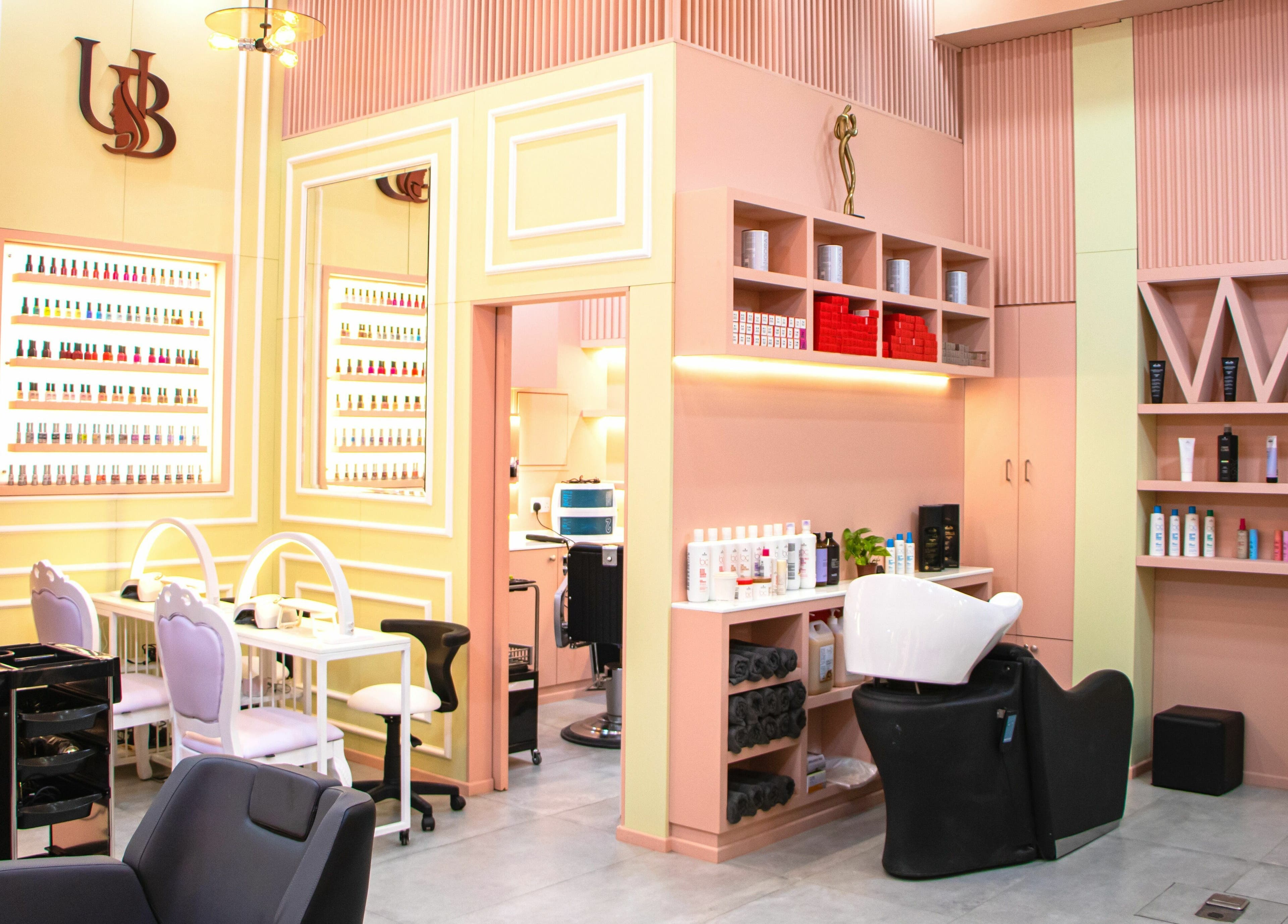 Beautiful interior of UB Beauty salon in Dubai, دبي, AE showcasing nail and hair care stations.
