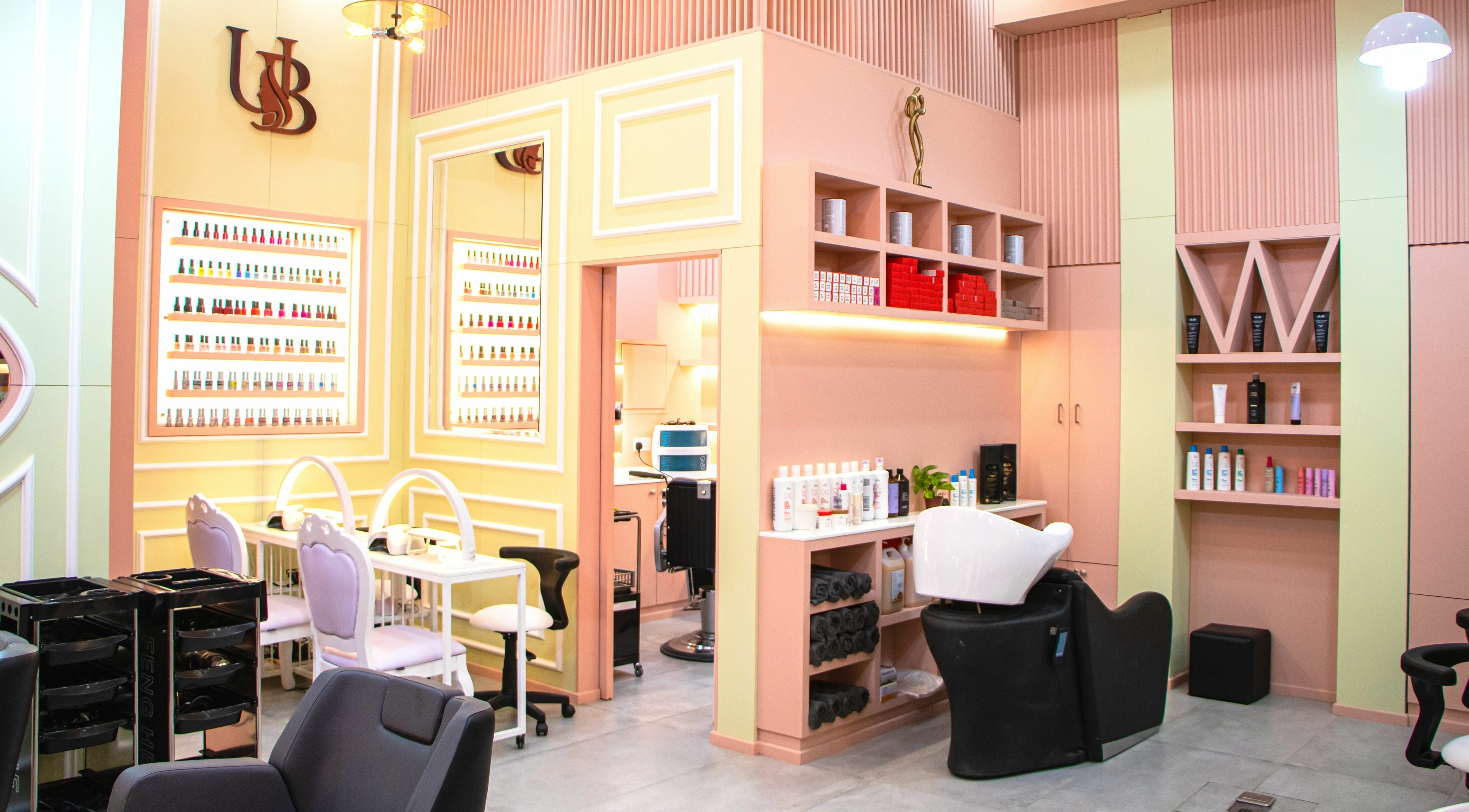 Beautiful interior of UB Beauty salon in Dubai, دبي, AE showcasing nail and hair care stations.