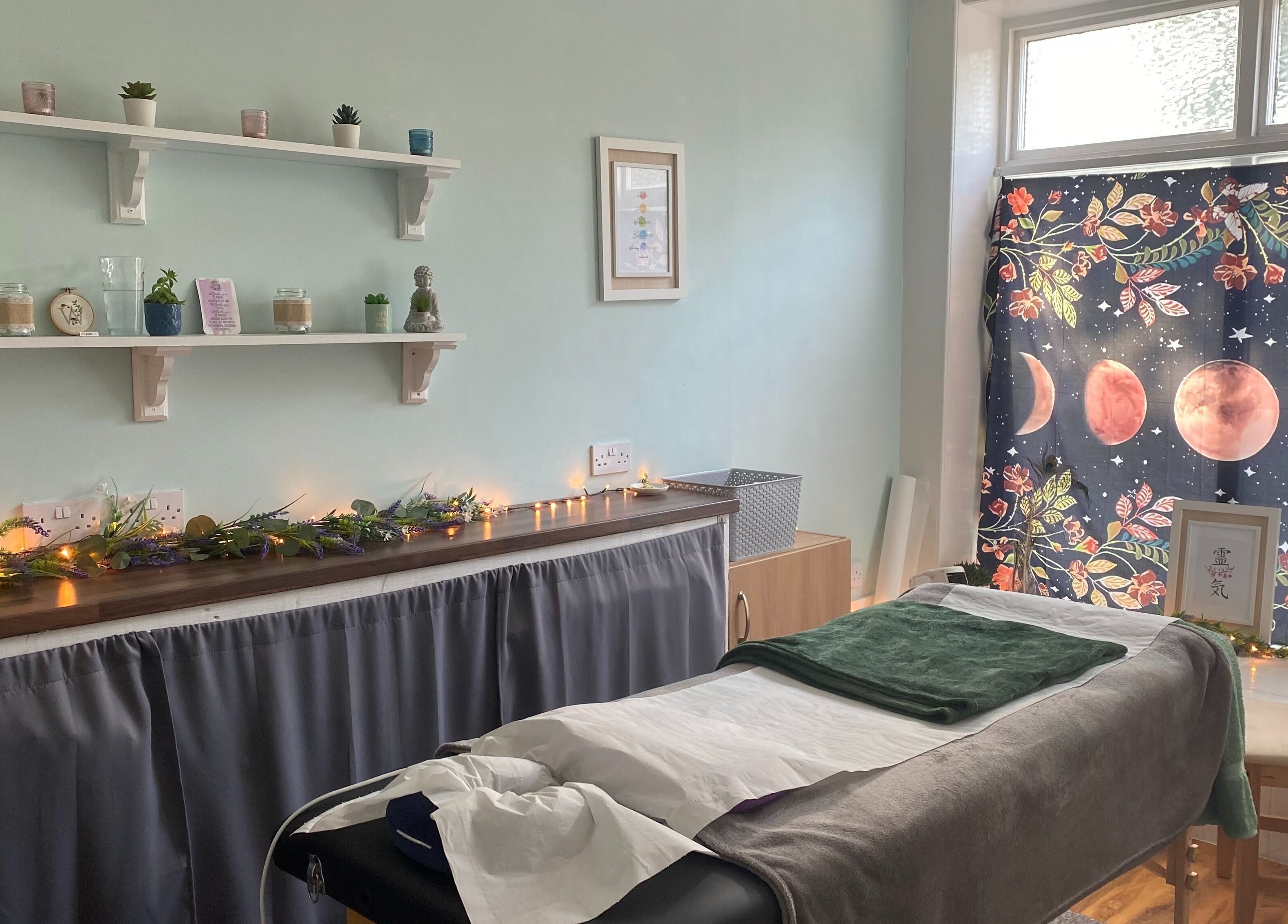 Relaxing massage room at Wonderland Wellbeing, North Shields, England, GB with soft lighting and serene decor.