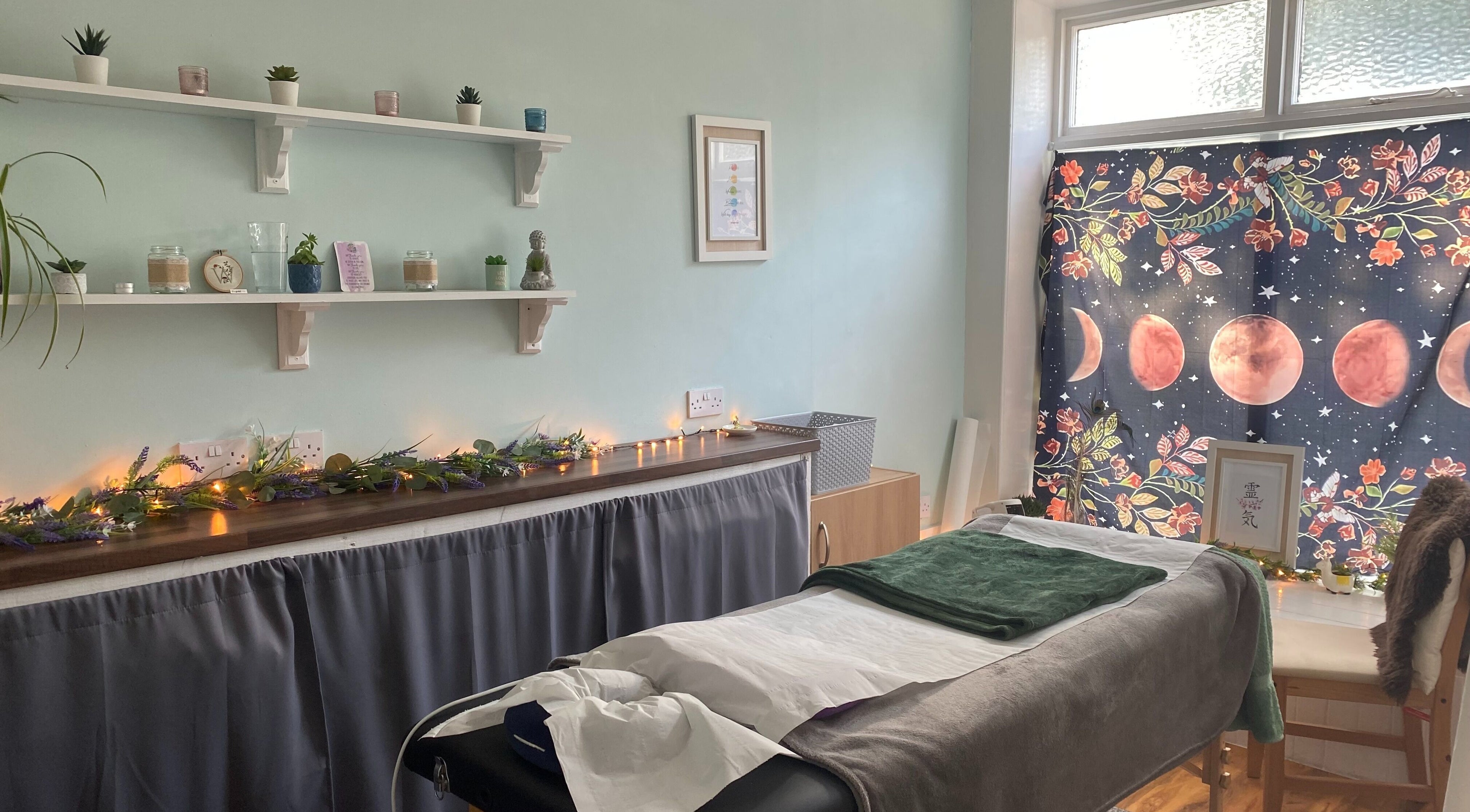 Relaxing massage room at Wonderland Wellbeing, North Shields, England, GB with soft lighting and serene decor.