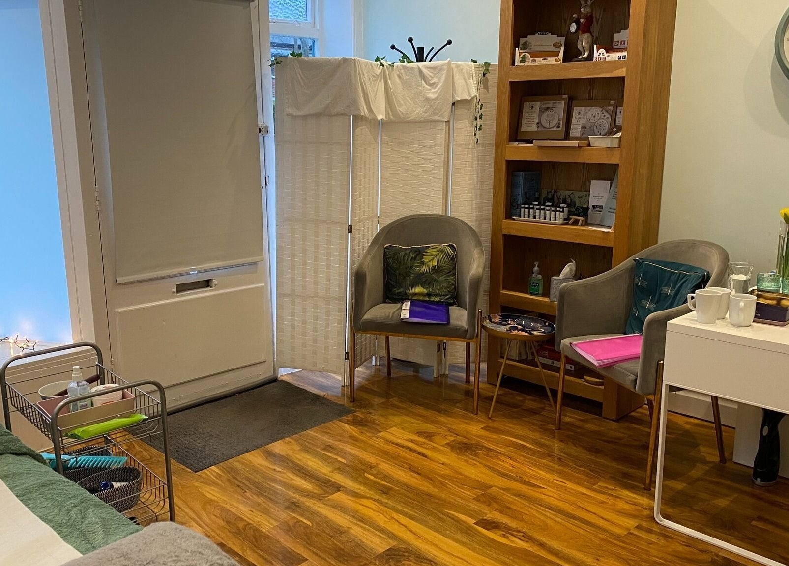 Cozy therapy room at Wonderland Wellbeing, North Shields, England, GB, featuring comfy chairs and a tranquil ambiance.