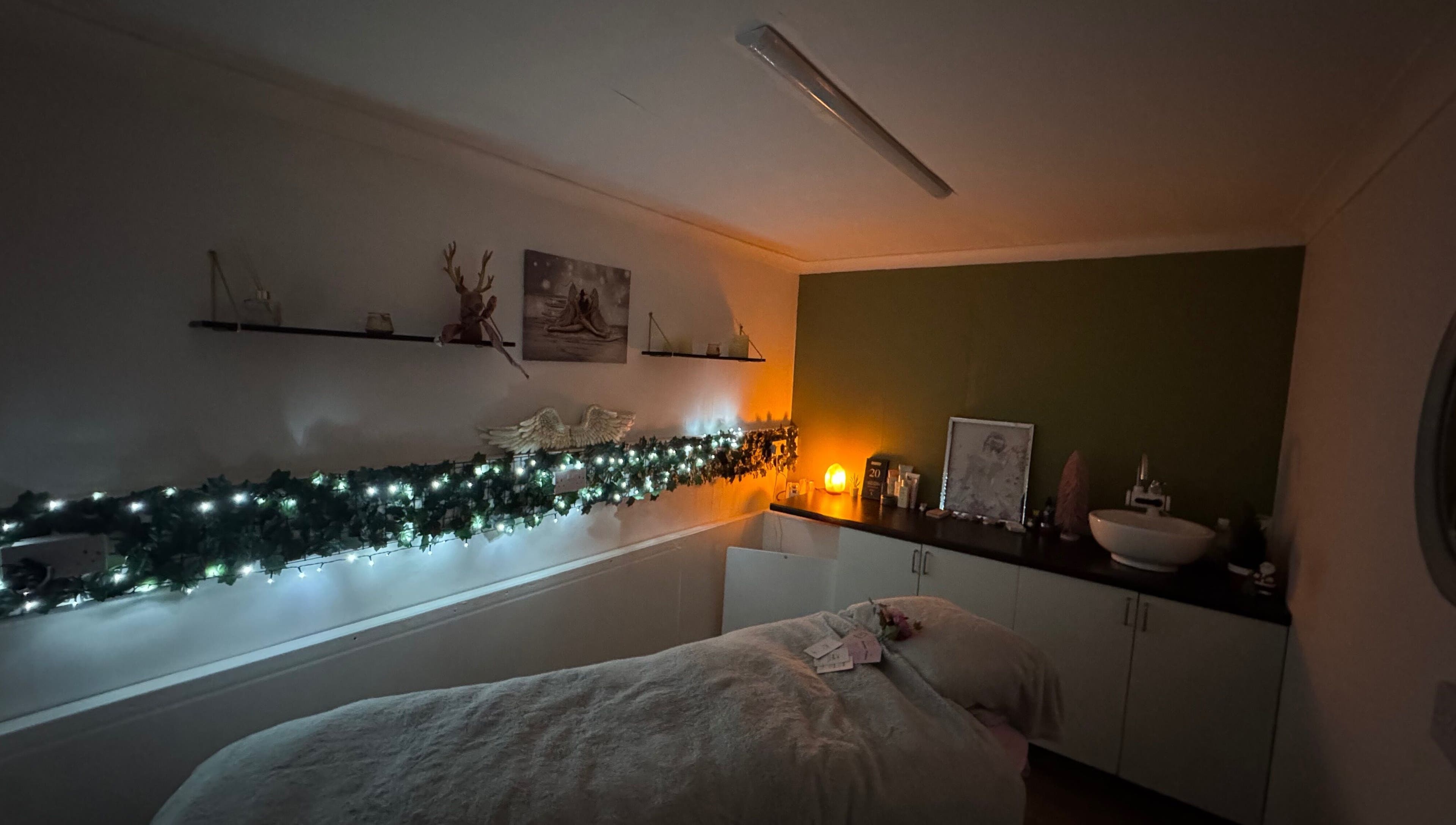 Relaxation room at Beauty of the Soul Spa Health and Beauty, Dumbarton, Scotland, GB, adorned with soft lighting.