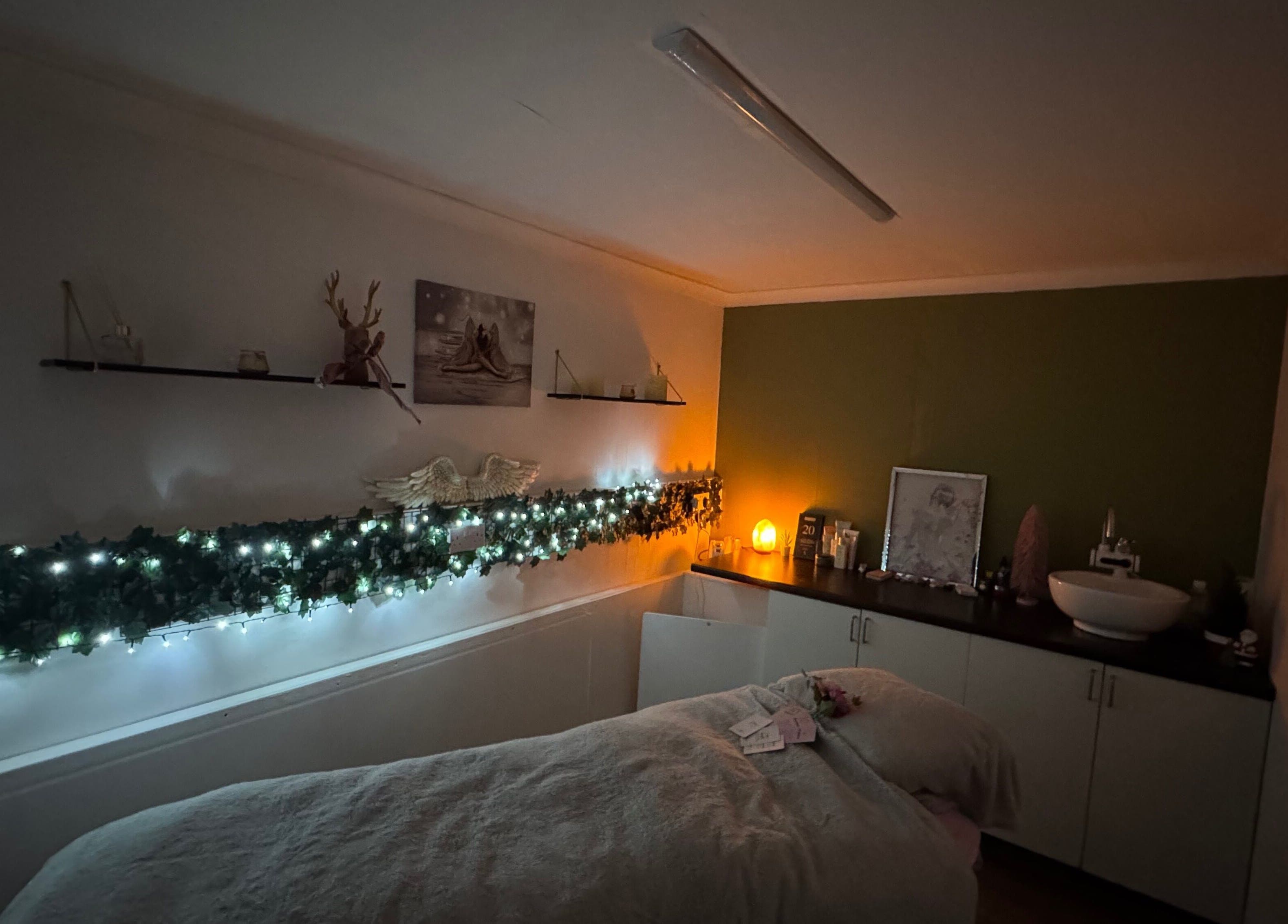 Cozy spa room at Beauty of the Soul Spa Health and Beauty, Dumbarton, Scotland, GB, elegantly lit and decorated.