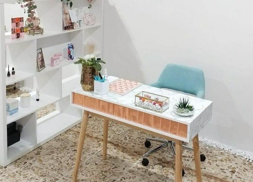 Elegant reception desk at The Seven Great Lashes in Melbourne, Victoria, AU showcases beauty and style.