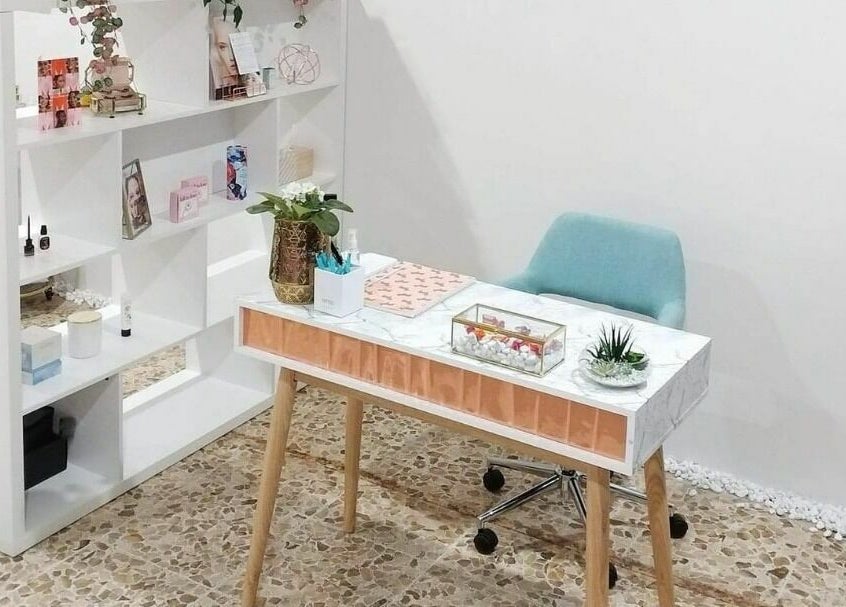 Elegant reception desk at The Seven Great Lashes in Melbourne, Victoria, AU showcases beauty and style.