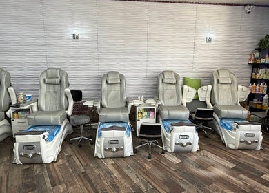 Sleek pedicure chairs at Nail Couture Cave Creek, Cave Creek, Arizona, US, offering a relaxing spa experience.