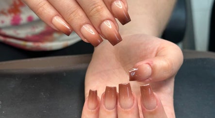 Elegant ombre nails at Nail Couture Cave Creek, Cave Creek, Arizona, US offer a chic manicure style.