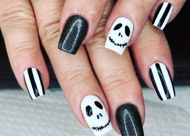 Creative black and white Halloween-themed nails at Nail Couture Cave Creek, Cave Creek, Arizona, US.