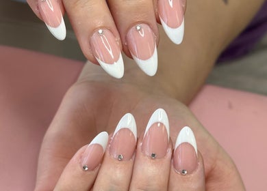 Beautiful French manicure with gems at Nail Couture Cave Creek, Cave Creek, Arizona, US.