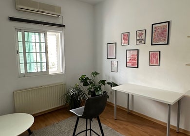 Bright room at Makeup by Evi K, Agios Dometios, Nicosia, CY featuring stylish decor and modern furniture.