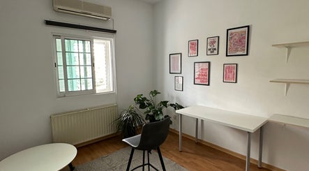 Bright room at Makeup by Evi K, Agios Dometios, Nicosia, CY featuring stylish decor and modern furniture.
