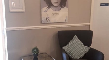 Comfortable seating at Serenity Hair, Tidworth, England, GB featuring stylish decor and inviting atmosphere.