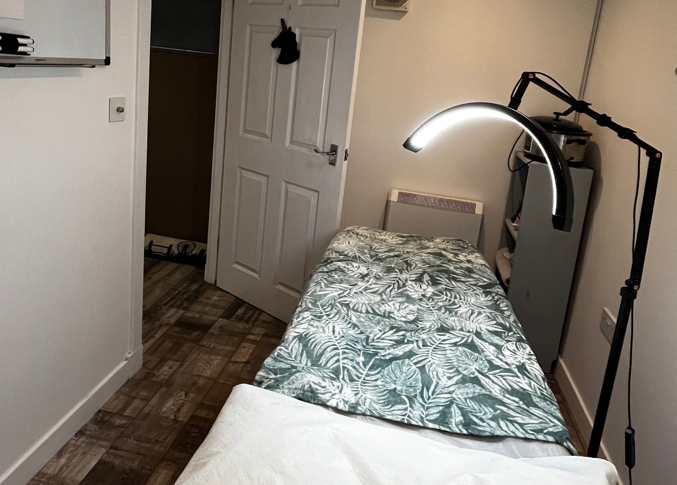 Relaxing massage room at LS Beauty and Massage in Linlithgow, Scotland, GB with a cozy massage table.