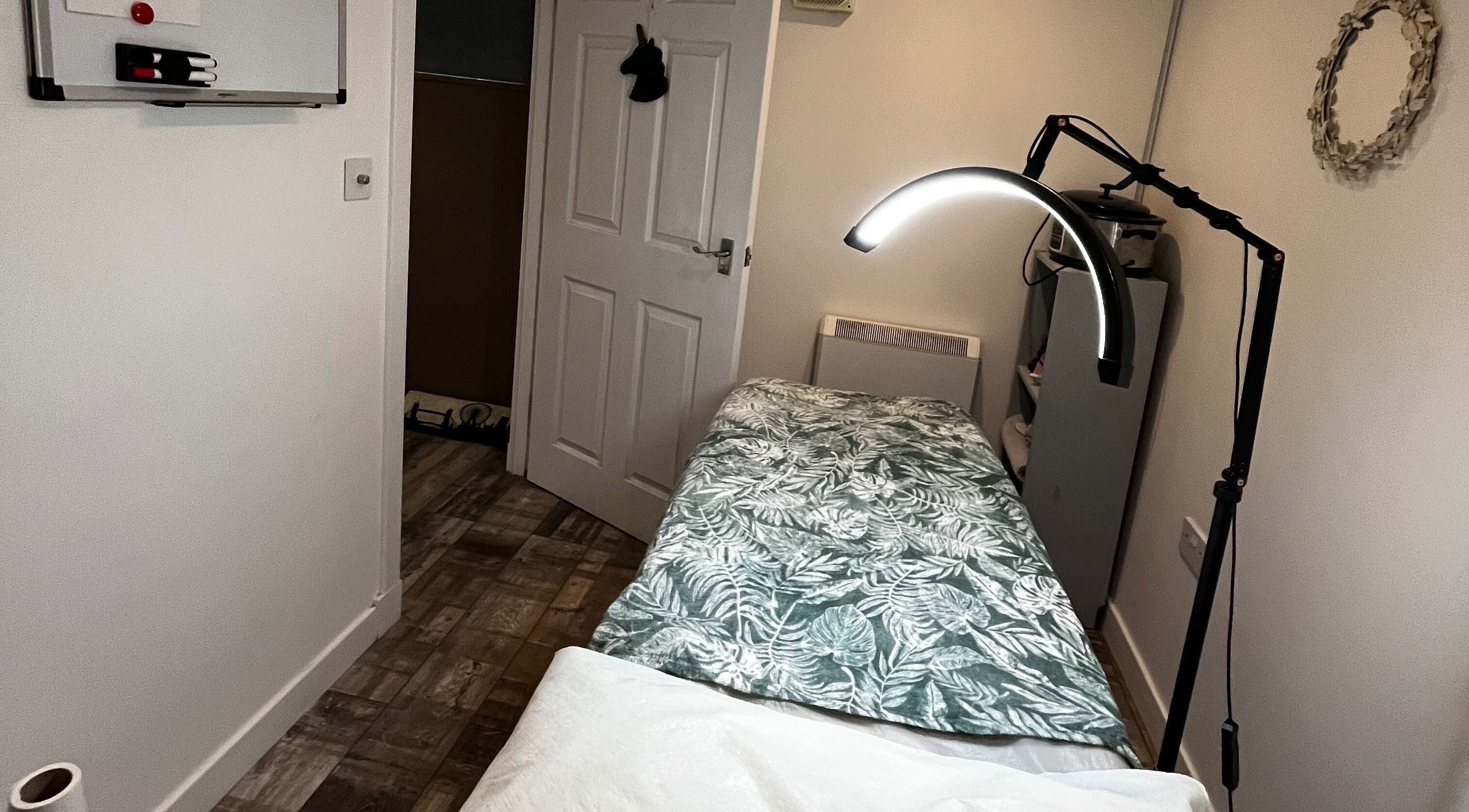 Relaxing massage room at LS Beauty and Massage in Linlithgow, Scotland, GB with a cozy massage table.