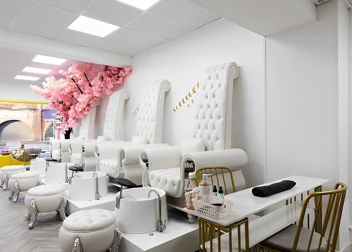 Luxurious pedicure chairs at Chocolate & Nails - Northfield, London, England, GB with chic decor and elegant setting.