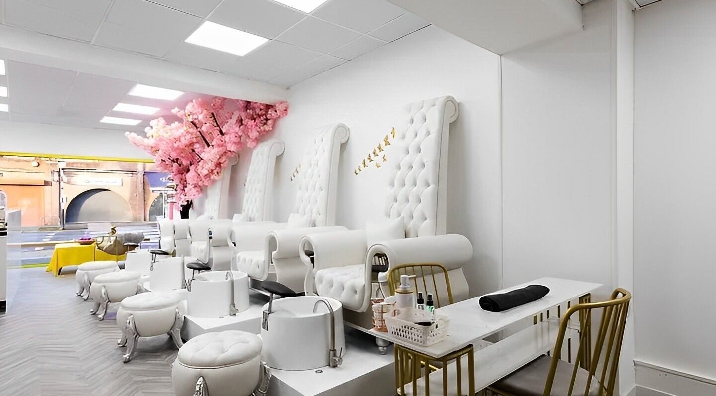 Luxurious pedicure chairs at Chocolate & Nails - Northfield, London, England, GB with chic decor and elegant setting.
