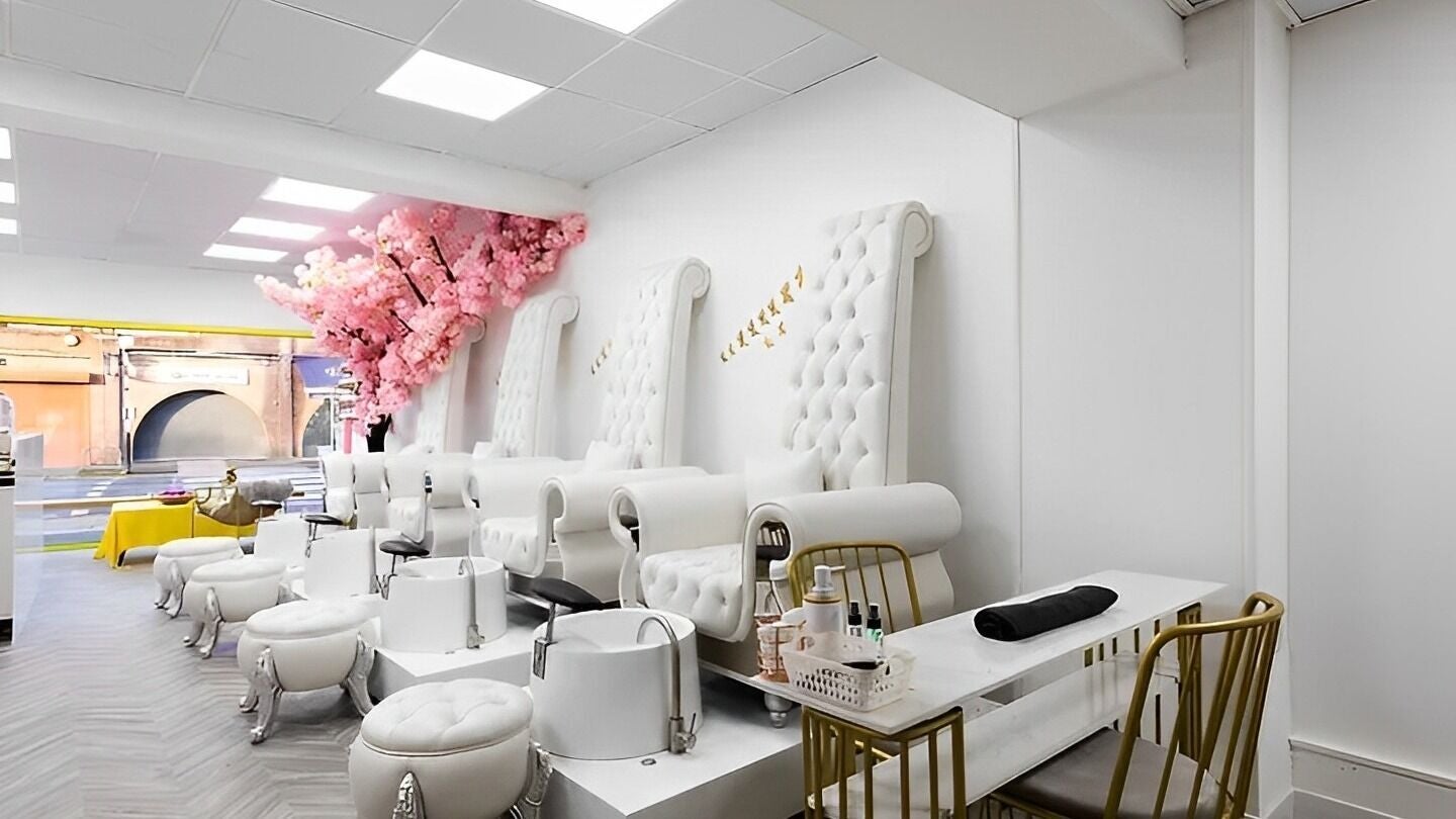 Luxurious pedicure chairs at Chocolate & Nails - Northfield, London, England, GB with chic decor and elegant setting.