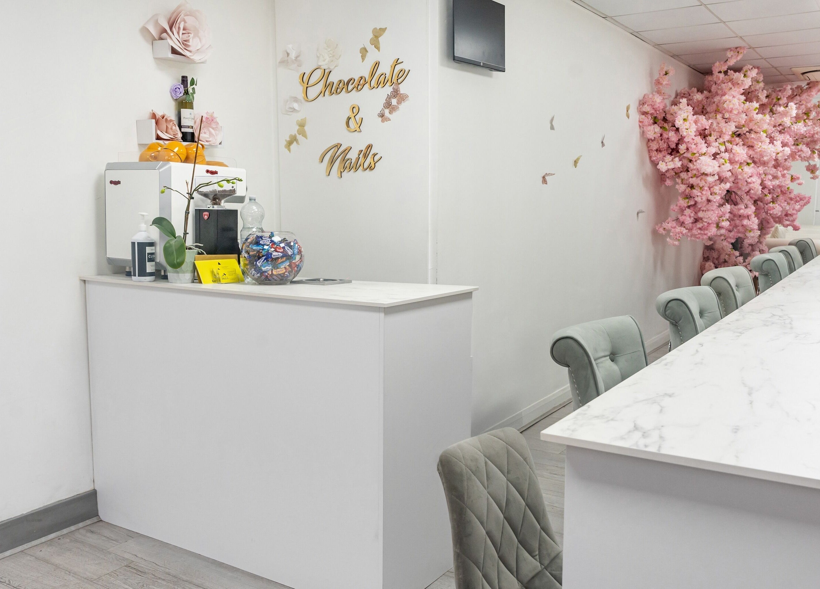 Elegant reception at Chocolate & Nails - Ealing Broadway, London, England, featuring cherry blossoms.