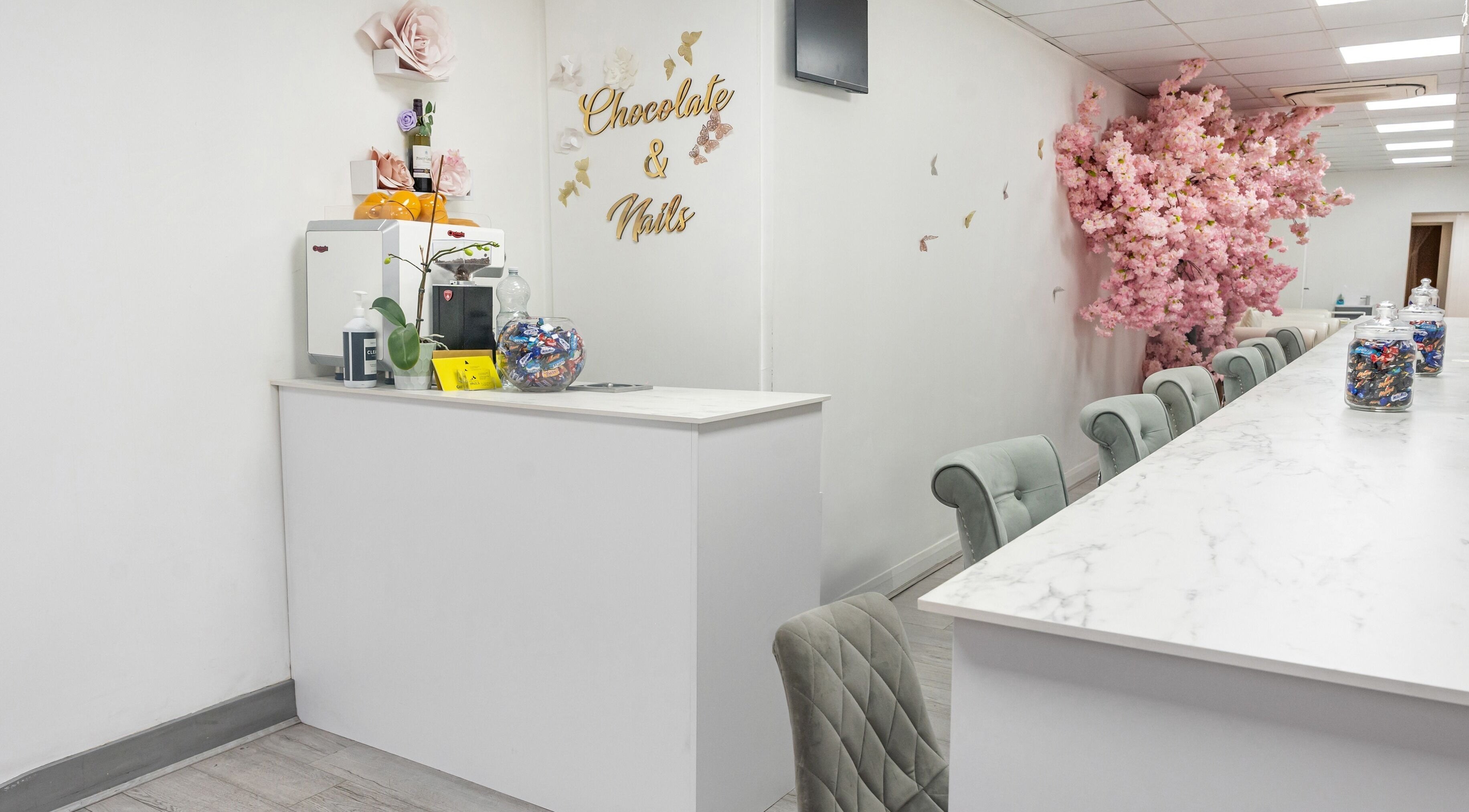 Elegant reception at Chocolate & Nails - Ealing Broadway, London, England, featuring cherry blossoms.